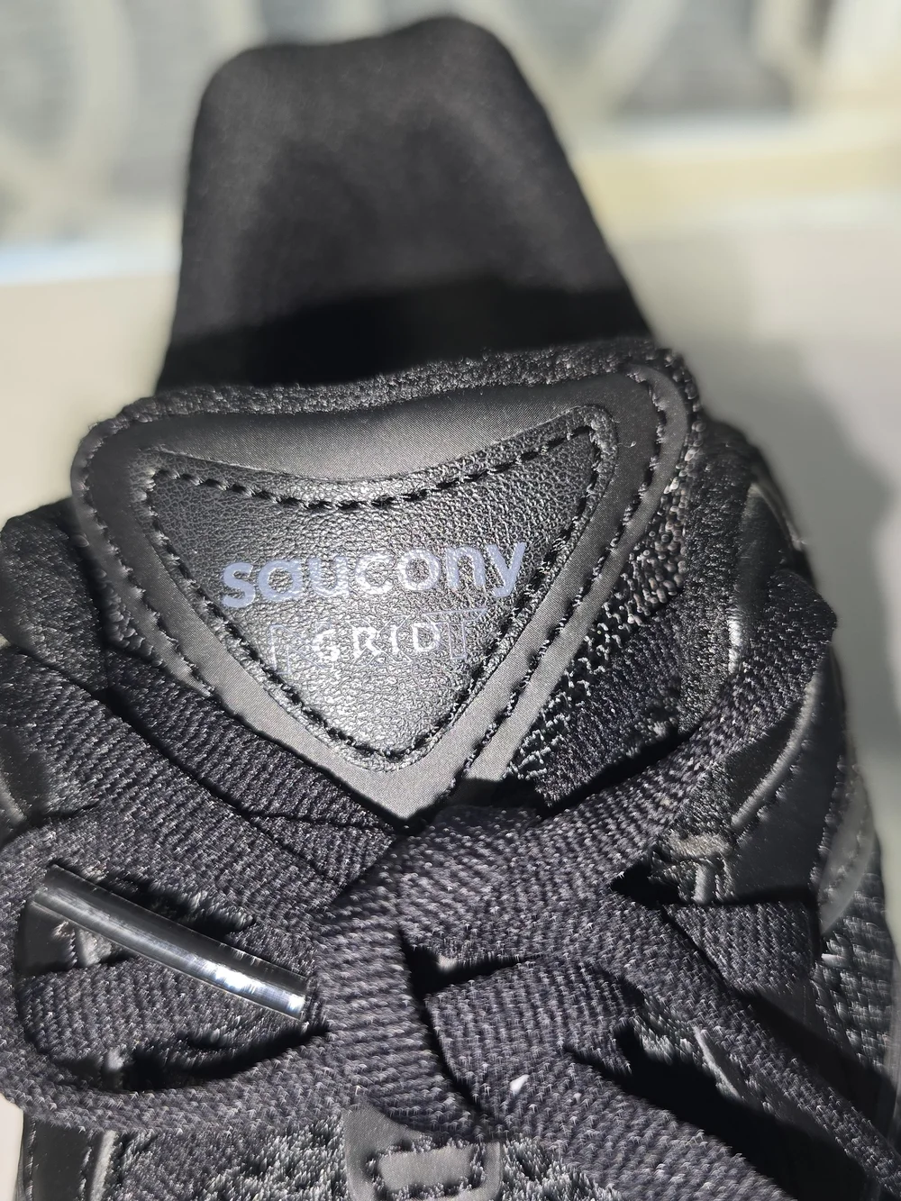 Saucony Men's Black Mesh and Synthetic Athletic Sneaker